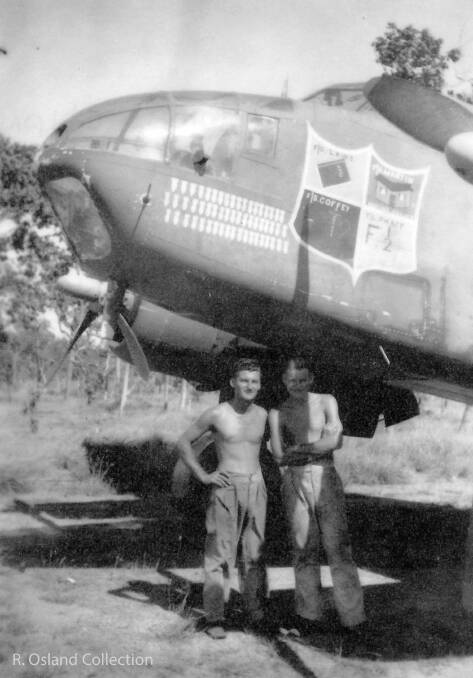 BOMBER: The 56 bombs painted on the aircraft, pictured with R.A.A.F. crew in PNG, signifies 56 missions it took part in. Picture: University of Newcastle's Cultural Collections