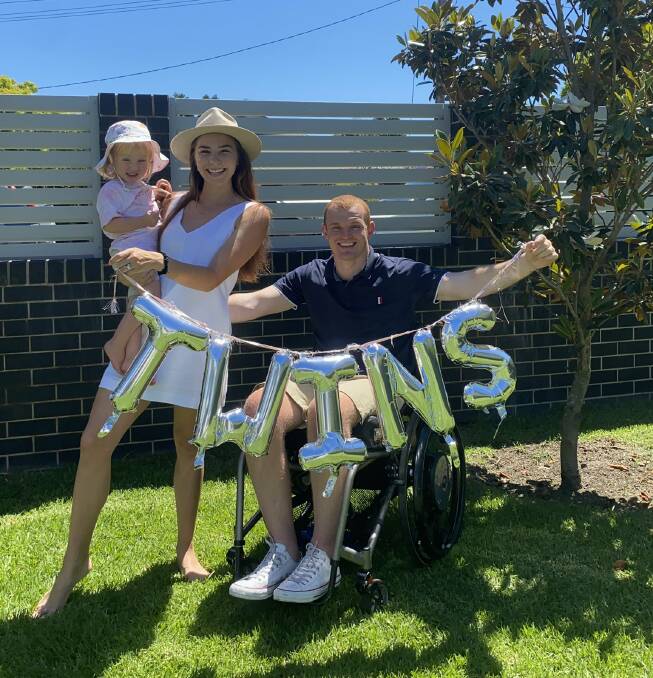 GREAT NEWS: Alex McKinnon, with wife Teigan and daughter Harriet. Picture: Twitter