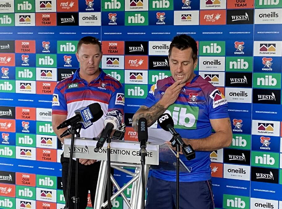 Knights coach Adam O'Brien and former skipper Mitchell Pearce on Thursday morning. Picture: Jonathan Carroll