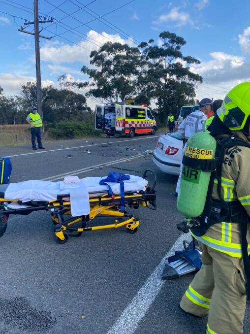 SMASH: Emergency services attended the scene on Tomago Road, shortly after a two-car collision. Picture: Fire and Rescue NSW 