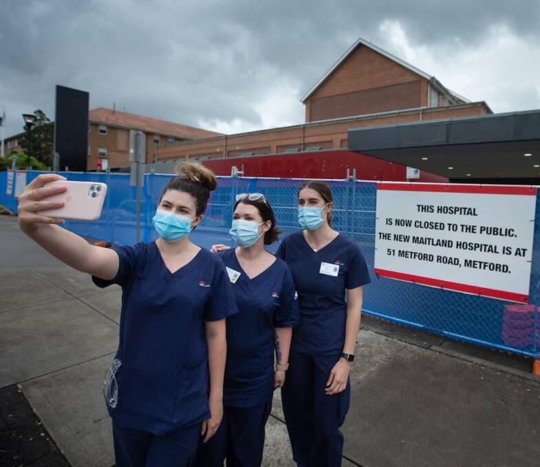 GOODBYE PIC: Brooke Budden, Stephanie Brasington and Ashely Taylor take a selfie outside the old hospital.