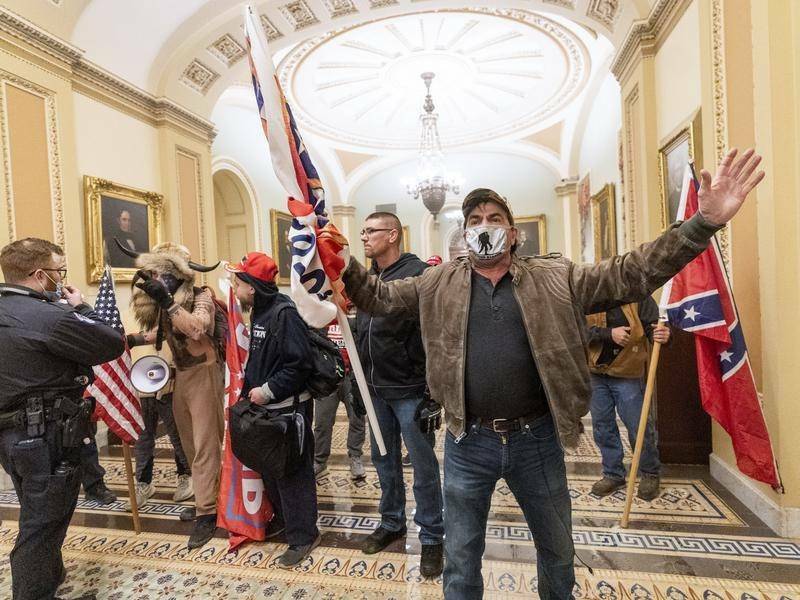CHAOTIC SCENES: Supporters of Donald Trump stormed the US Capitol building.
