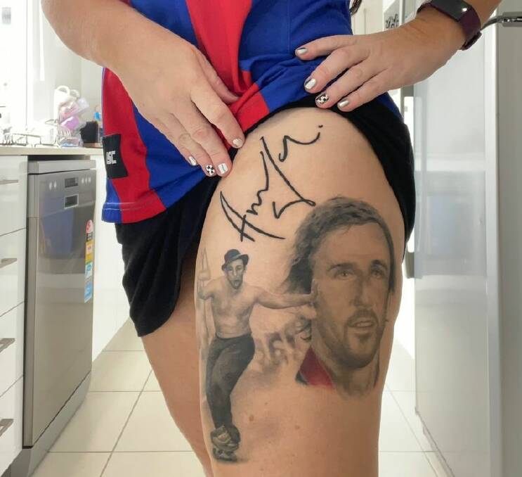 SIGNATURE ARTWORK: Amy Pepper shows off her freshly tattooed leg.
