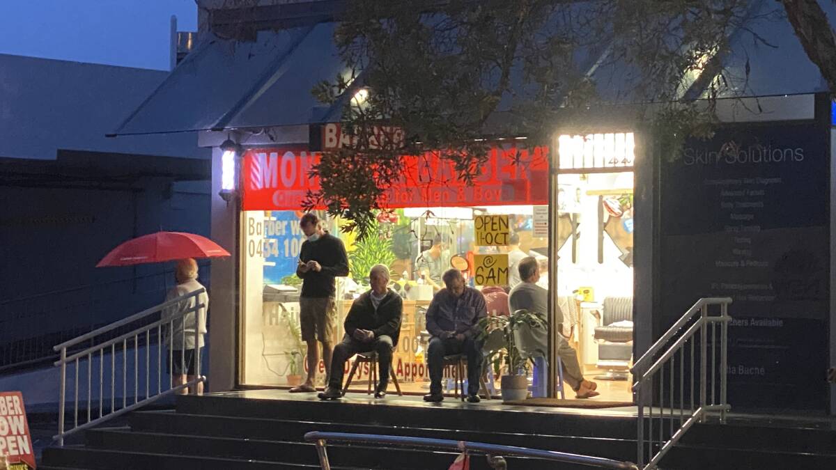 FREEDOM: Men were lining up outside a Mona Vale barber shop for a haircut at 6am on 'Freedom Day', Monday, October 11. 