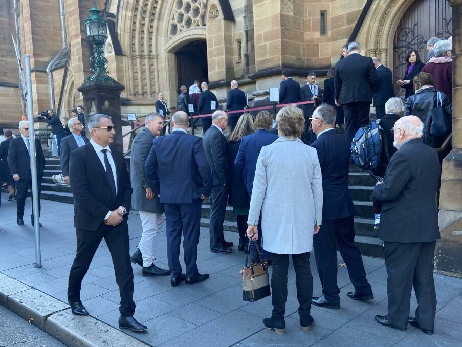Crowds gathering ahead of the state funeral for Bob Fulton at St Mary's Cathedral in Sydney. Picture: Adam Lucius