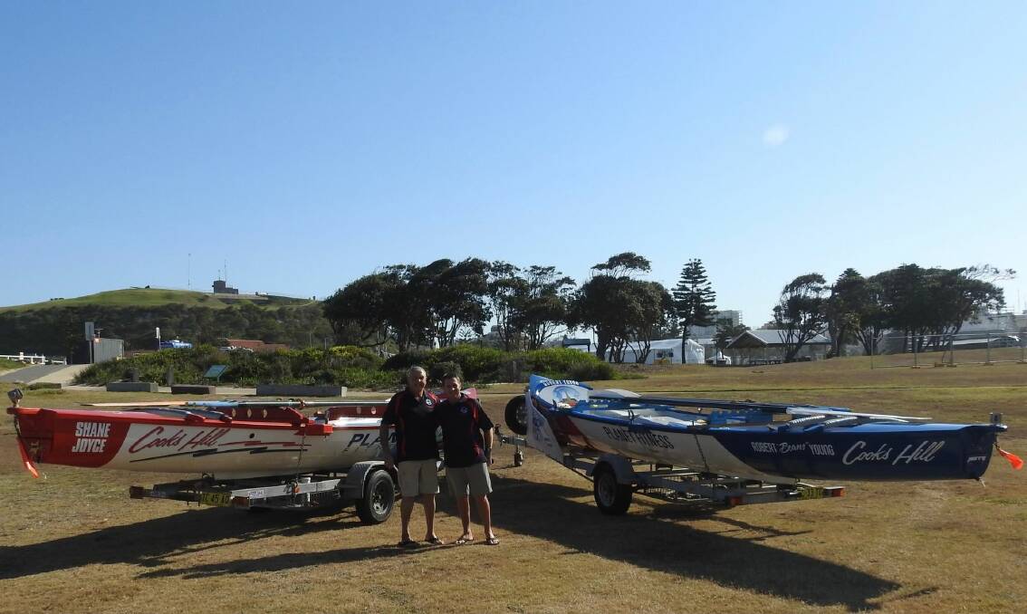 Shane Joyce and Robert Young with the surf boats named after them. Picture supplied