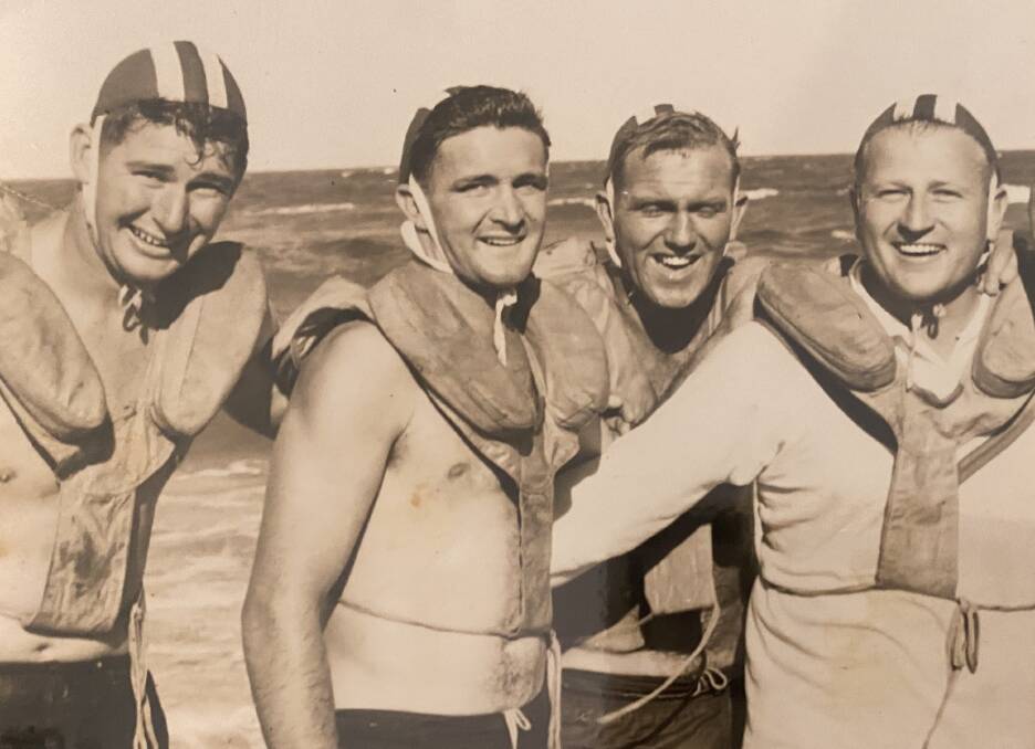 Dudley Sills, second from left in a branch championship winning Cooks Hill crew at Nobbys in the 1950s. Picture supplied