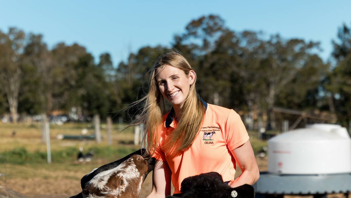 Celina Pellett, 25, feels at home at the Gloucester dairy farm. Picture supplied