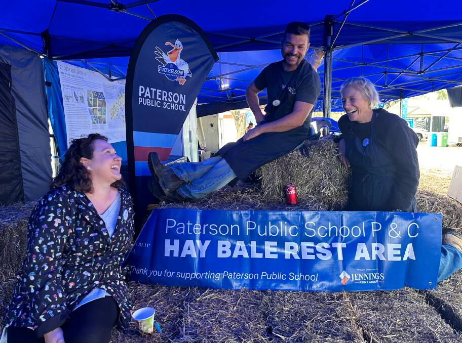 Paterson Public School P&C members Kate Meyn-Shrimpton, Darren Gill and Heidi Barker at the Tocal Field Days. Picture by Alanna Tomazin