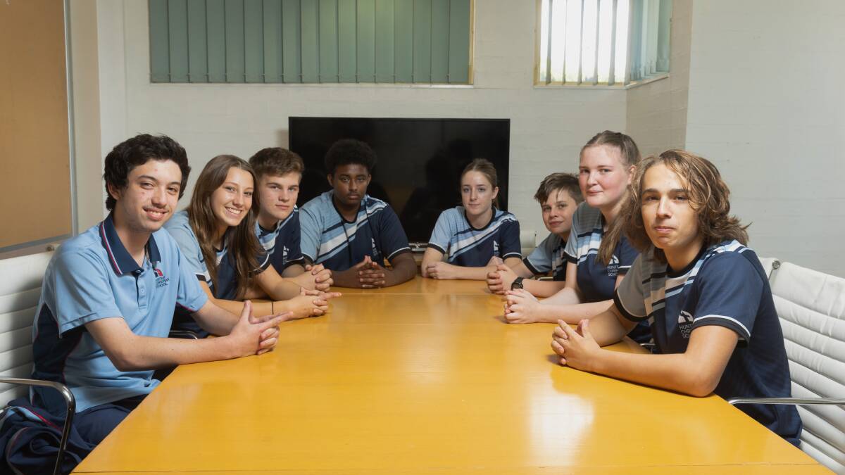 The young entrepreneurs of Hunter Christian in the 'Shark Tank' board room. Picture by Marina Neil