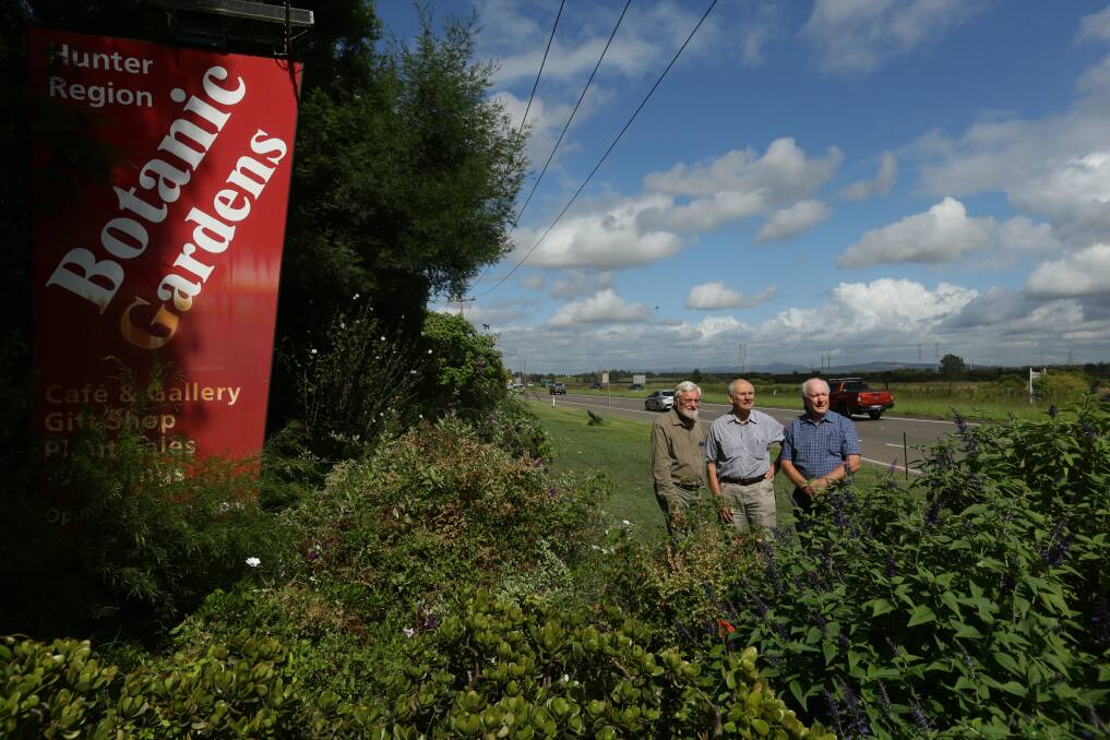 Hunter Region Botanic Gardens directors Ken Page, Tim Roberts and Robert Beautemont hold concerns for their gardens' future with a bypass planned for their front door. Picture by Jonathan Carroll