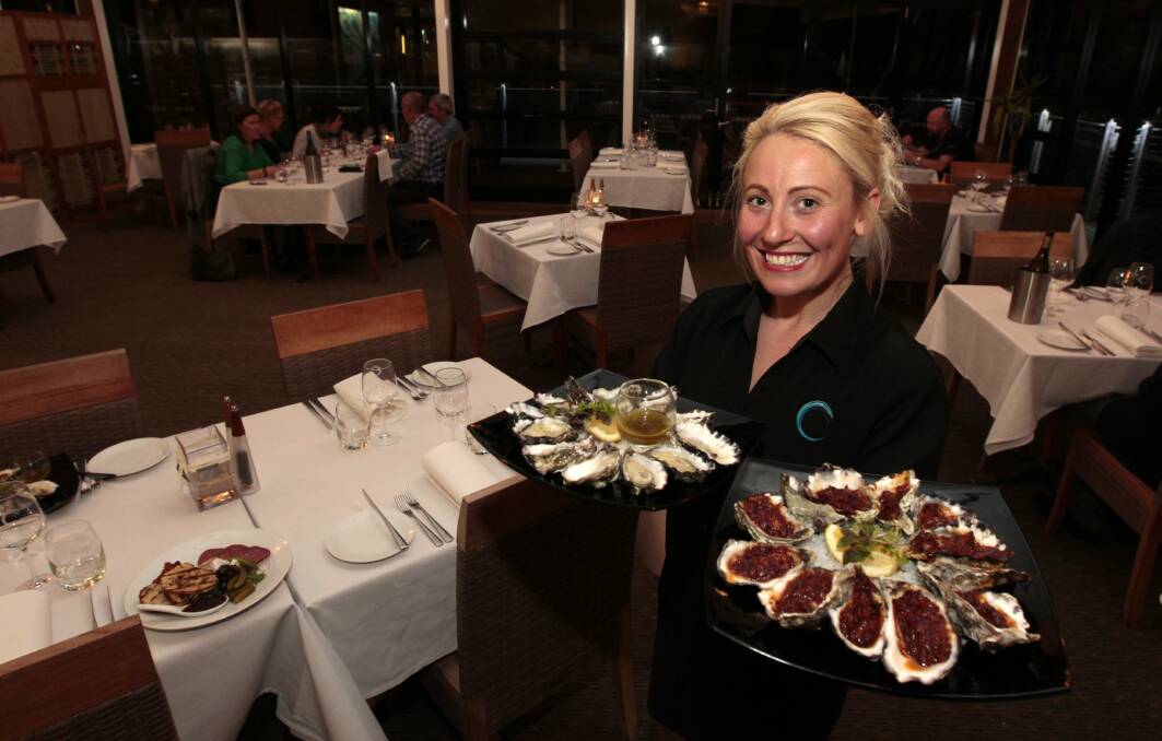 FEAST: Atriplex manager Laura Hobson with Sydney Rock Oysters. Caves Beachside Hotel, Picture: Jonathan Carroll