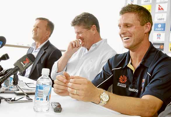 LIGHT-HEARTED: Star recruit Jason Culina with father Branko, far left, and Jets CEO Ken Edwards yesterday. - Picture by Max Mason-Hubers
