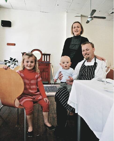 HAT TRICK: Restaurant II's Peter Bryant with his wife Therese and their children Emily and Liam at the Bolton Street establishment yesterday.- Picture by Dean Osland
