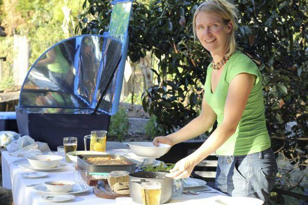 SUNNY SAVINGS: Heather Stevens with the Sun Cook solar oven.