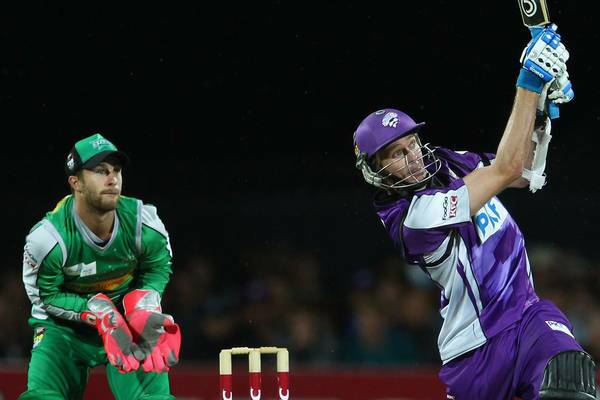 HAVING A LASH:  Michael Hogan in action with the  bat for the Hobart Hurricanes last season. Picture: Getty Images