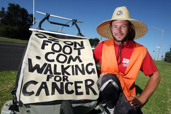 FUND-RAISING CAMPAIGN: Andrew Cadigan on the road.  Picture: Dean Osland