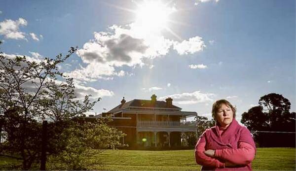 PRESERVATION: Cr Janelle Risby in front of Skellatar House, Muswellbrook, which she said would be blocked from view. - Picture by Dean Osland