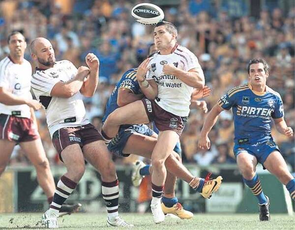 COLLISION: Ben Farrar runs into Parramatta fullback Jarryd Hayne during Manly's defeat last weekend. - Picture by Getty Images