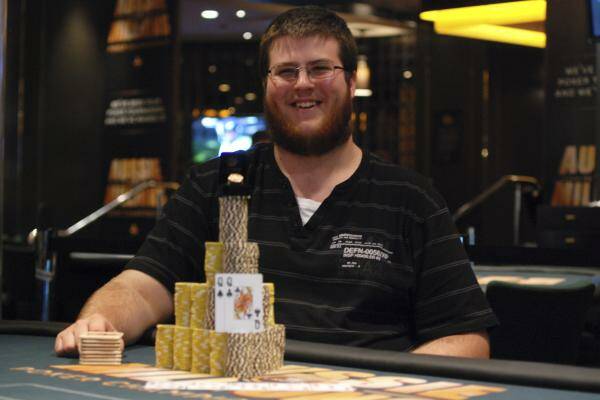 HOLDING THE ACES: Martin Drewe after his $200,000 Aussie Millions collect.