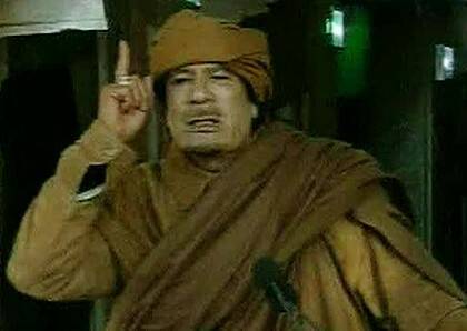 Defiant ... Moammar Gaddafi.