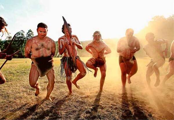 PASSION: Dancers warm up yesterday for this evening's corroboree at Wollombi. It is the annual event's 20th anniversary. - Picture by Simone De Peak