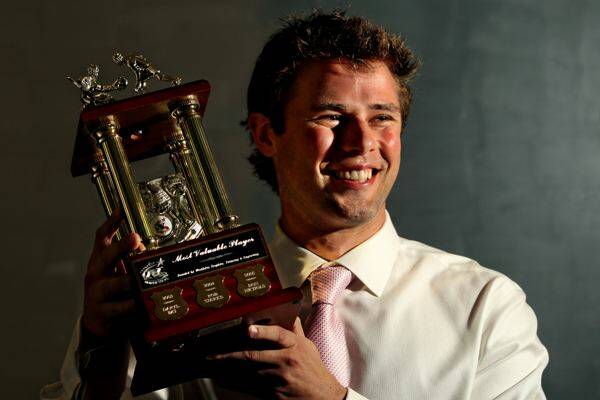 COOL CUSTOMER: North Stars MVP Peter Cartwright with his trophy last night.  –  Picture by Simone De Peak
