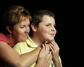 IMPROVEMENT: Connor Wink, 11, and his mother Tracey.