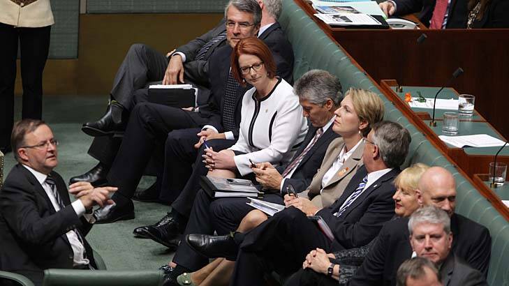 Should I stay or should I go: Julia Gillard looks to supporters on Thursday. Photo: Alex Ellinghausen