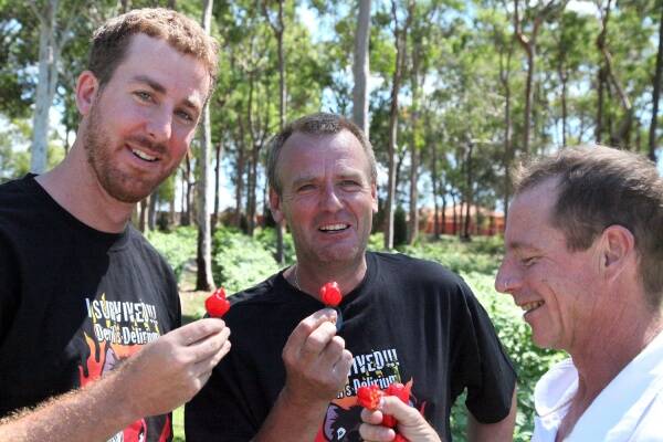 HOT HOT HOT: Mark Peacock, Marcel de Wit and Neil Smith contemplate an encounter with the Trinidad Scorpion.