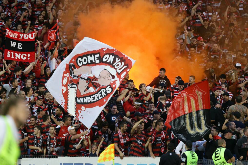 PARTISAN: Wanderers fans in the stands during their side's last meeting with the Newcastle Jets, in December.