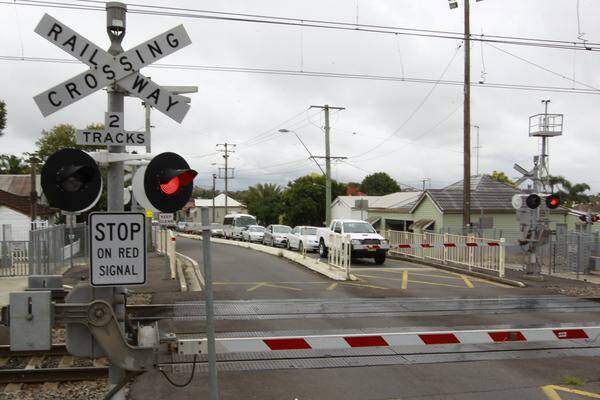 CONGESTED: Long wait at Adamstown rail crossing. - Picture by Peter Stoop