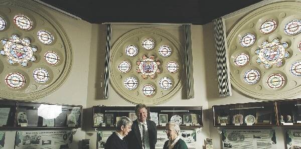 REMARKABLE: Sister Maureen Salmon, left, Paul Greaves and Sister Patricia Egan surrounded by St Joseph's history. - Picture by Ryan Osland