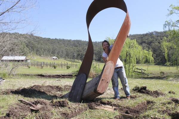 FINALIST:  Joanna O’Toole with her sculpture Sou Westerly, which will be a feature of next month’s Sculpture in the Vineyards in the historic Wollombi Valley.