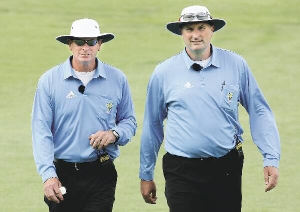 HOWZAT: Former Test bowlers Paul Reiffel and Paul Wilson umpiring a one-dayer at the WACA last weekend. - Picture by Getty Images