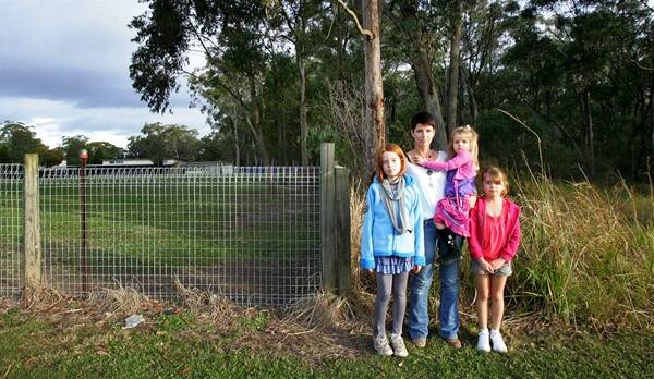 CAMPAIGN: Kate Washington, of Medowie, says a new high school is needed for children like her three daughters.