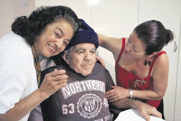 WIN: Facility resident Rocco Miccoli, centre, with wife Nicoletta, left and daughter Velia McMillan yesterday.- Pictures by Anita Jones