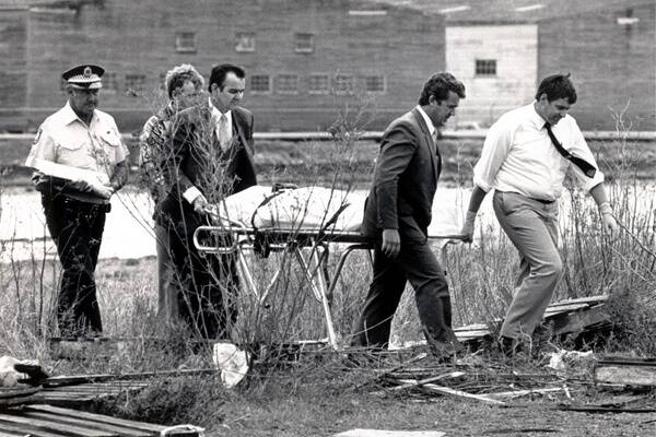 NO CHARGES: Police at the crime scene in 1987.