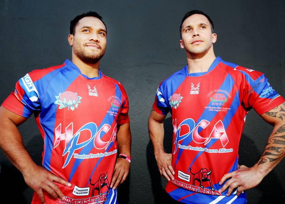 GOOD CAUSE: Carl Manu and Hayden Pedersen model the one-off jumper for prostate cancer. Picture: Ryan Osland