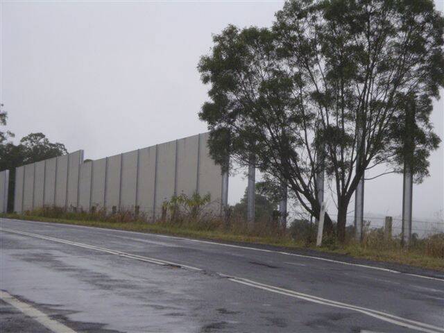 EYESORE: Yancoal’s wall on Gloucester tourist route Bucketts Way has upset some locals.3.JPG