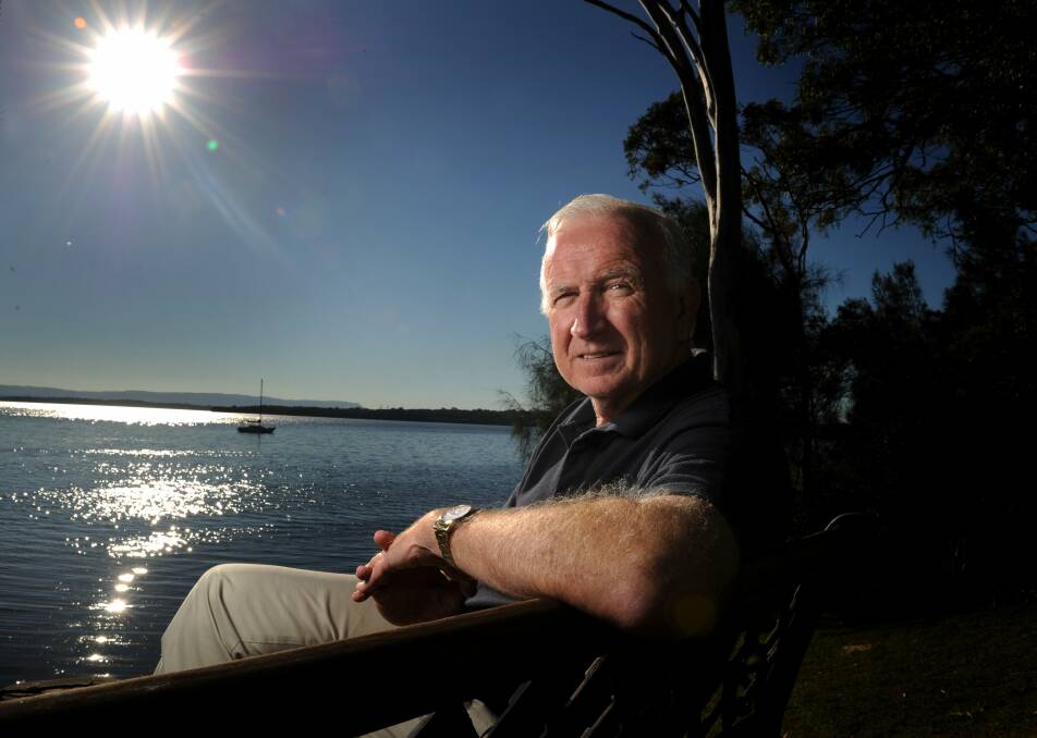 FATHER FIGURE: Adrian Hurley takes time out from writing his book on Australian basketball at the Olympics between 1956 and 2000, at his Chain Valley Bay home. Picture: Marina Neil
