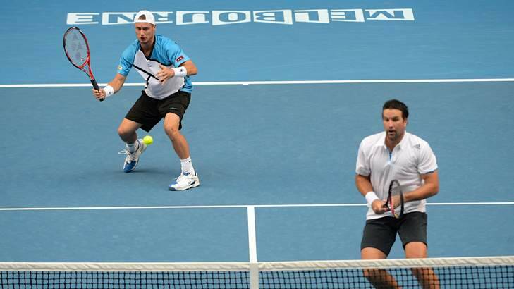 Winding back the years: Pat Rafter and Lleyton Hewitt joined forces in the men's doubles. Photo: Pat Scala