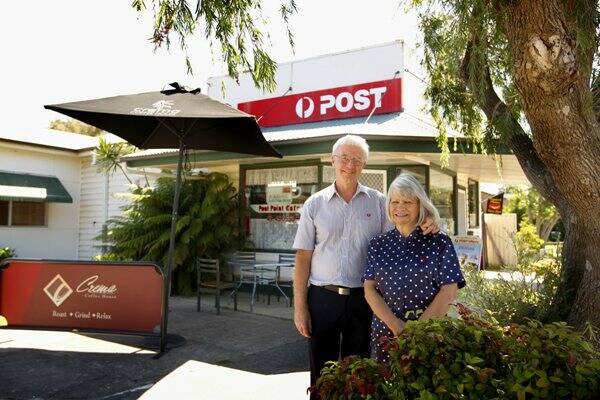 AT YOUR SERVICE: Colin and Denise Batchelor at the Marks Point post office, which doubles as a cafe.  Picture by Peter Stoop