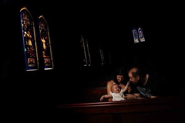 FORMAL: Meagan and Lachlan Clarke and baby Scarlett. –  Picture by Jonathan Carroll
