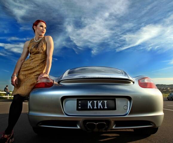 PLATED:  New Lambton resident Kristen Perry, known since childhood as Kiki, and her car. –  Picture by Simone De Peak