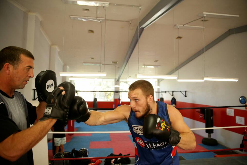 FIGHT CLUB: Nathan Ross trains at Broadmeadow PCYC yesterday. Picture: Ryan Osland