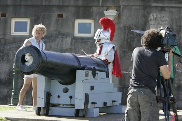 PRIMED: Alby Sandals and Sir Rusty (Chris Kelly) prepare to fire the cannon yesterday. - Pictures by Peter Stoop