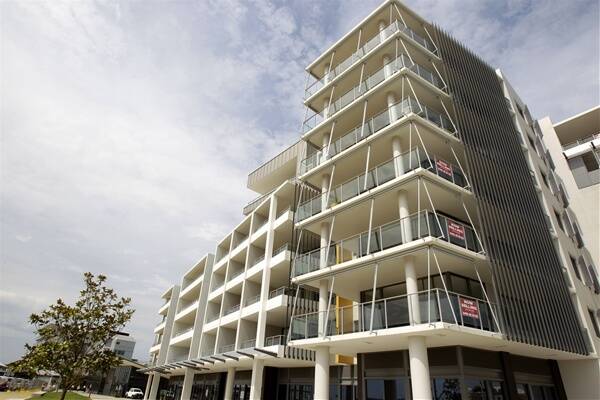 RARE OPPORTUNITY: The Lee Wharf apartments, above, with its views of the harbour, below.