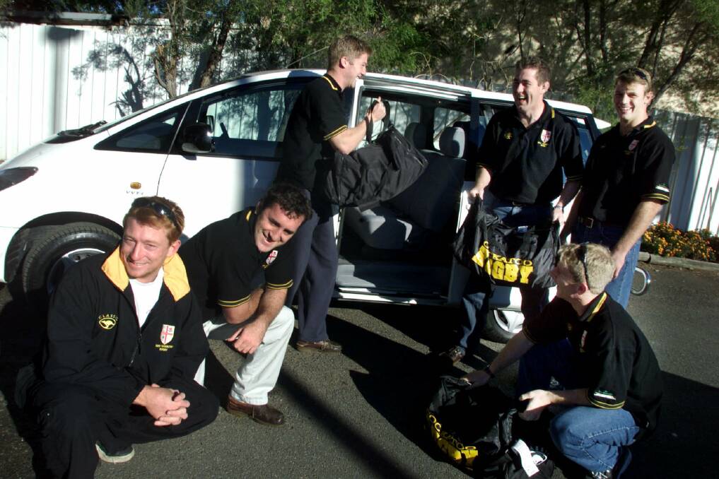 THAT WAS THEN: Matt Brown, Keiran Shepherd, Ryan MacDougall, Brent Dale, Darren Dimmock and Nathan Croft pack their rental car before heading to Coffs Harbour to play the British and Irish Lions in 2001. Picture: Simone De Peak