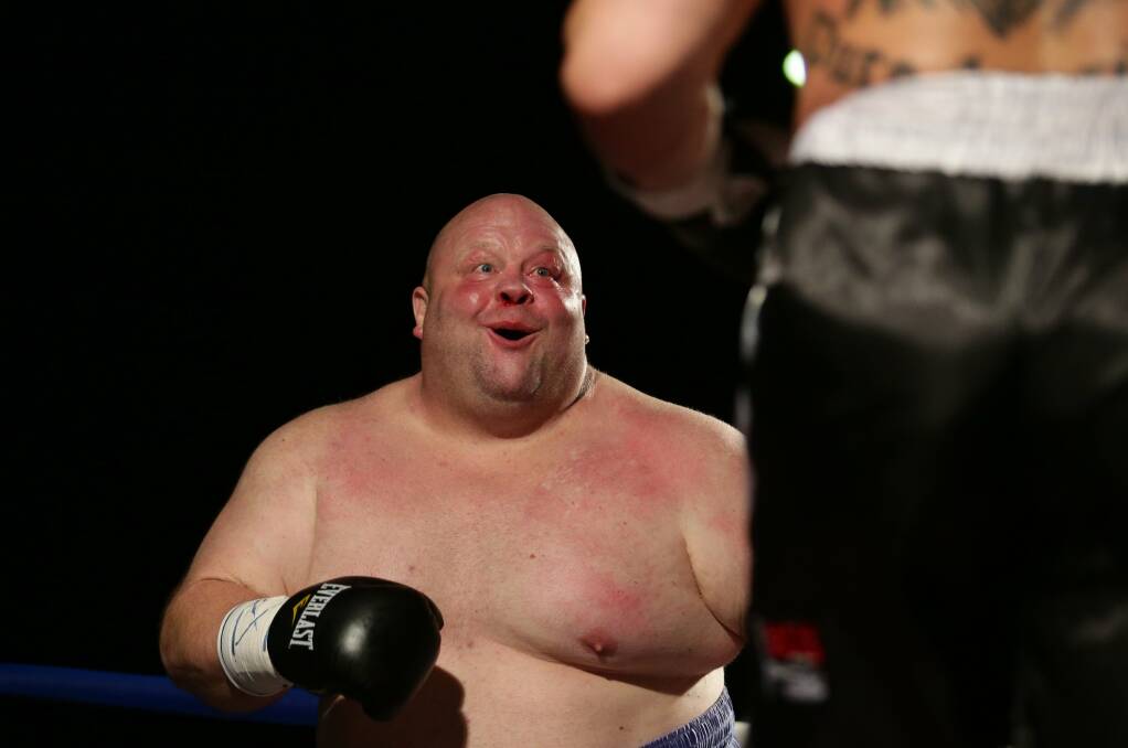 Butterbean congratulates  Kirk Lawton on his win. Picture: Peter Stoop